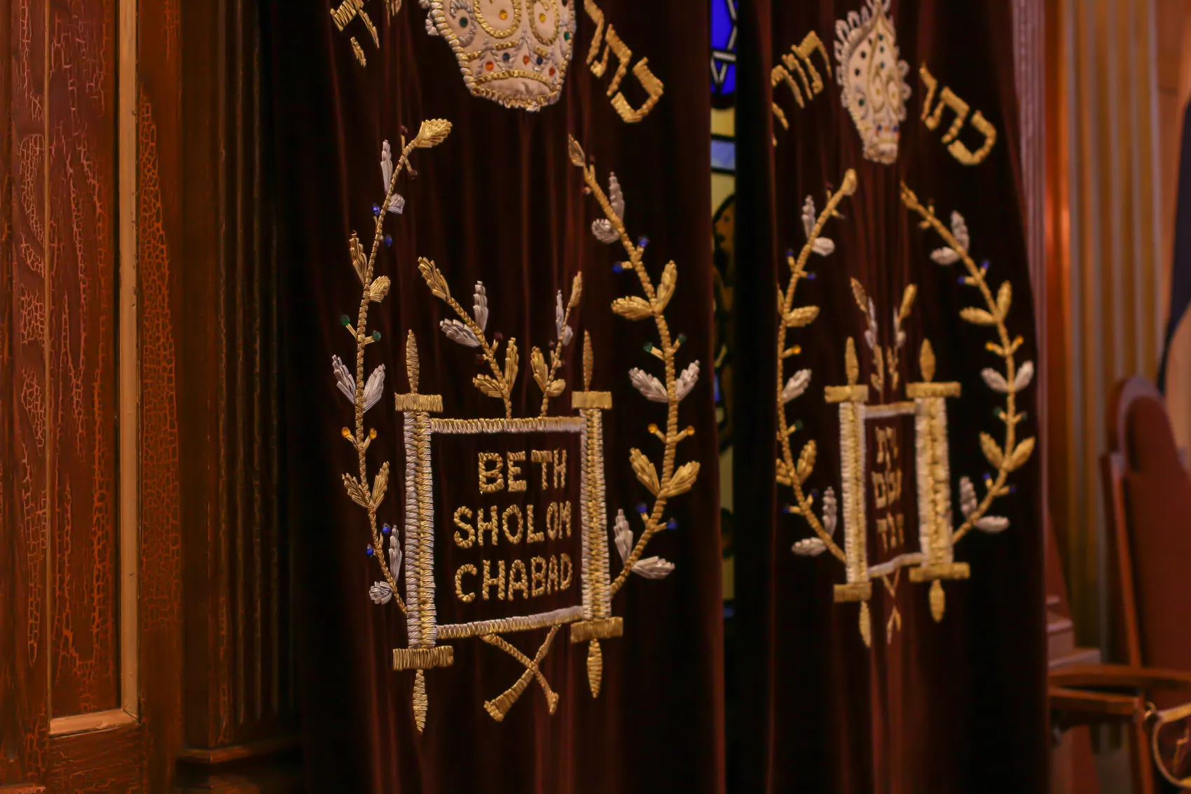The shul's maroon velvet parochet, embroidered in gold with Beth Sholom Chabad